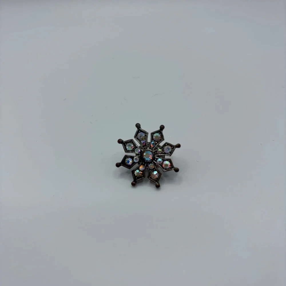 Vintage Snowflake Pin Iridescent AB Rhinestone Starburst Gunmetal Lapel Brooch